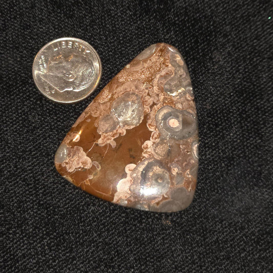 Large birds eye rhiolite free form cab #17